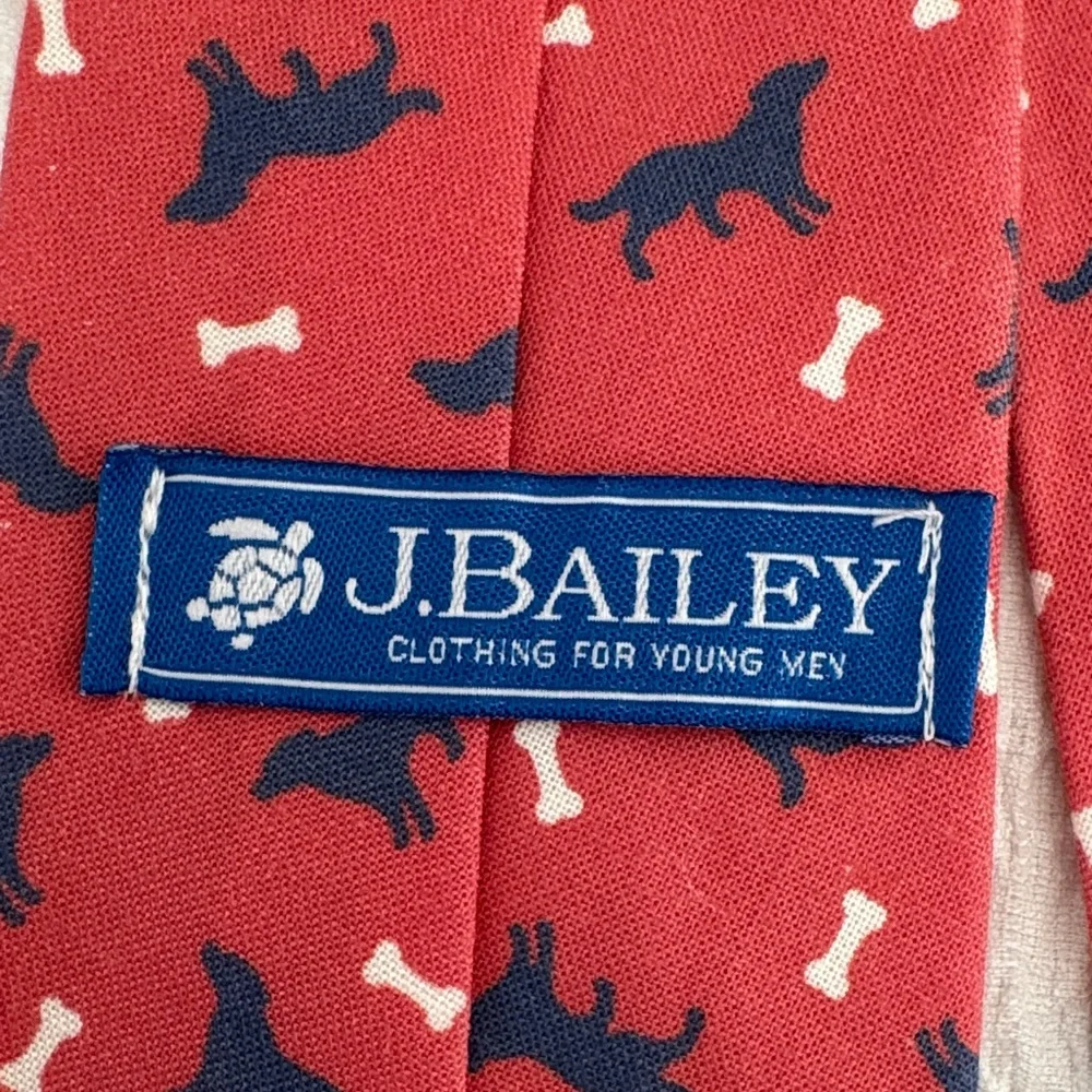 Kids coral/orange and Blue dog and bone Patterned Tie. J. Bailey.